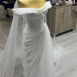 Elegant White Off-Shoulder bridal gown